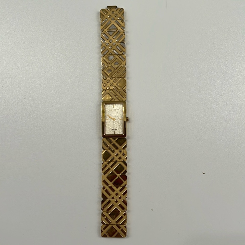 Gold color Burberry watch